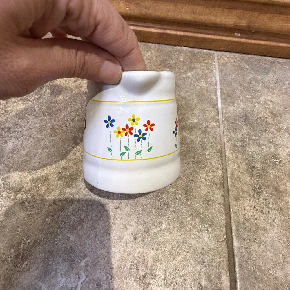 Vintage ceramic‎ 3/4 cup measuring pitcher with charming floral design.